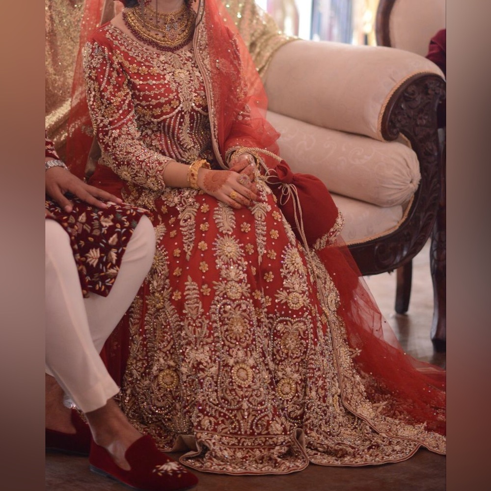 Traditional Pakistani Indian bridal lehenga in red